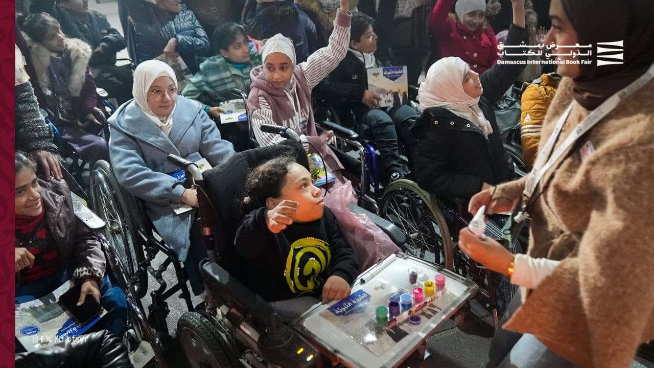 A notable presence of a number of people with disabilities at the Damascus Book Fair
