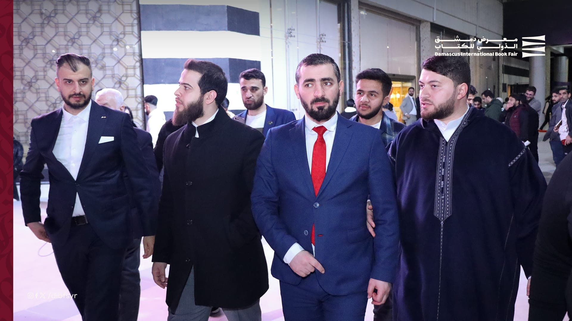 Jordanian reciter Adham Nabulsi tours the halls of the Damascus International Fair