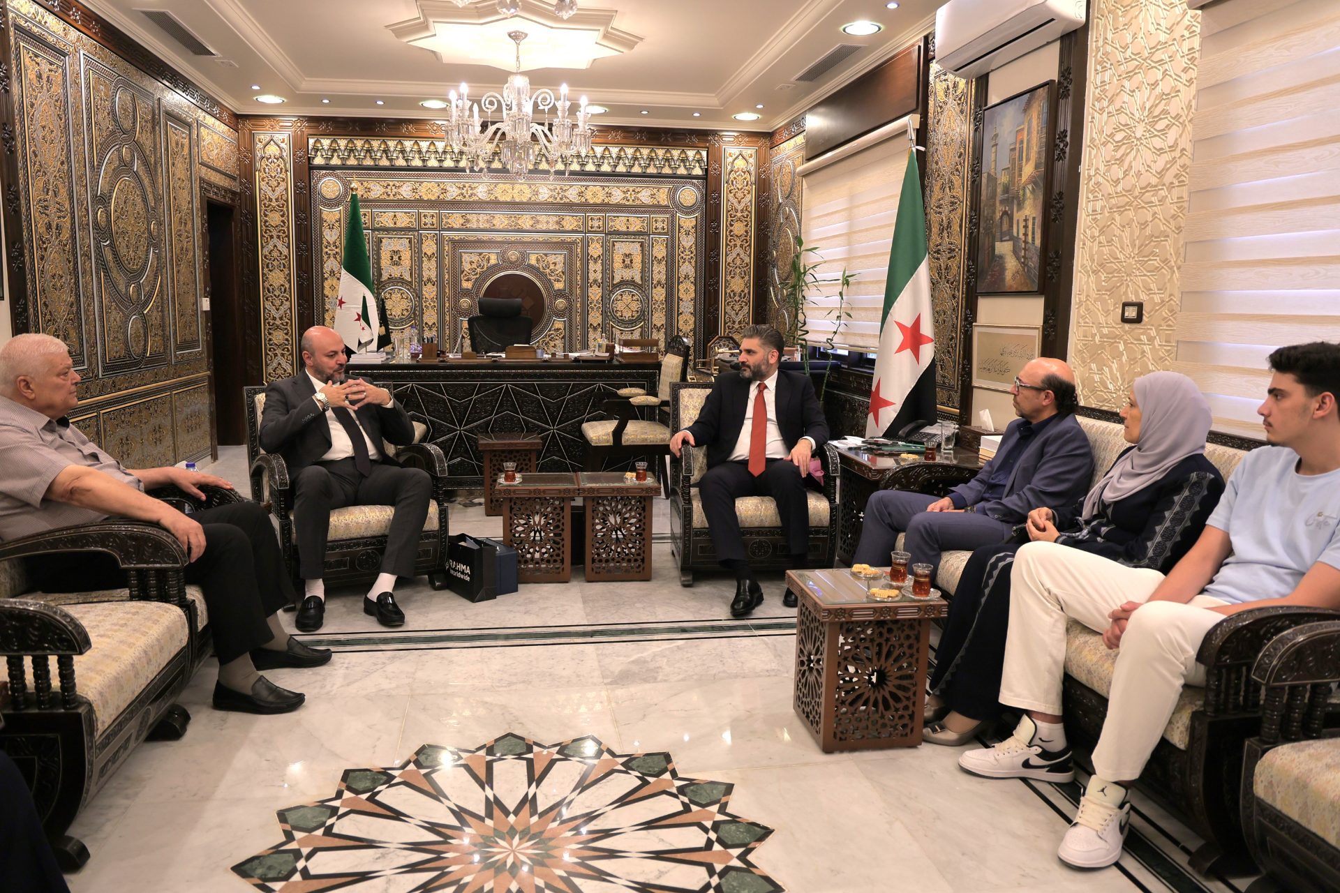 The Minister of Culture receives the director of the film "Little Gandhi" and the family of the martyr Ghiyath Matar