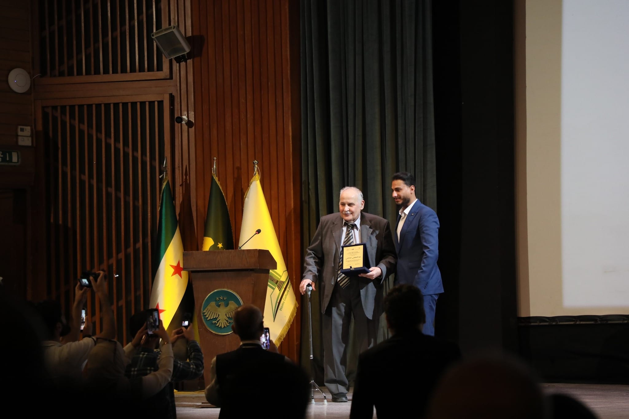 Honoring a number of prominent figures, at the conclusion of the "April Homs" festival